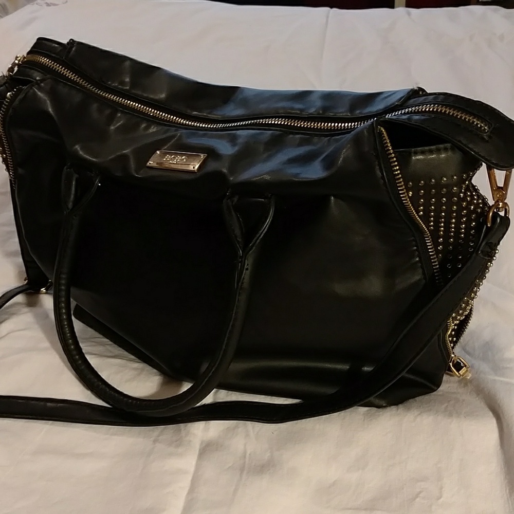 Black BCBG bag with gold studded and zipper accent